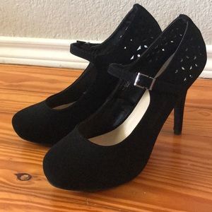 Madeline girl black stilettos.